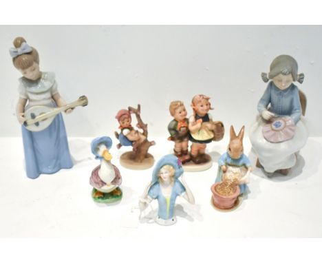 A mixed lot of figures including two Nao examples, two Beatrix Potter figures with gold back stamps comprising 'Jemima Puddle