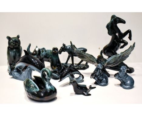 BLUE MOUNTAIN POTTERY; eight animal figures including bald eagle, owl, elephant, also four Poole Pottery animal figures inclu