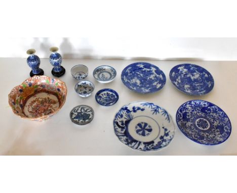 A mixed lot of decorative Oriental items including a Japanese blue and white plate, a pair of modern Chinese vases, blue and 