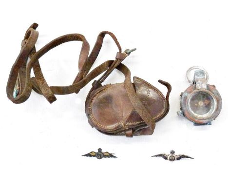 WWI compass in leather case, dated 1917, and&nbsp;two white metal Royal Air Force sweetheart badges&nbsp;(3)&nbsp;