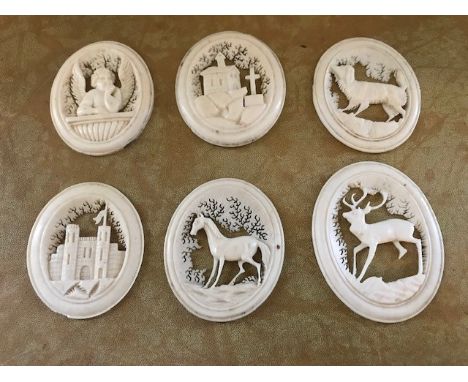 ****** ITEM LOCATION BISHTON HALL**********A set of six late 19th Century European carved bone fretwork oval medallions (6)