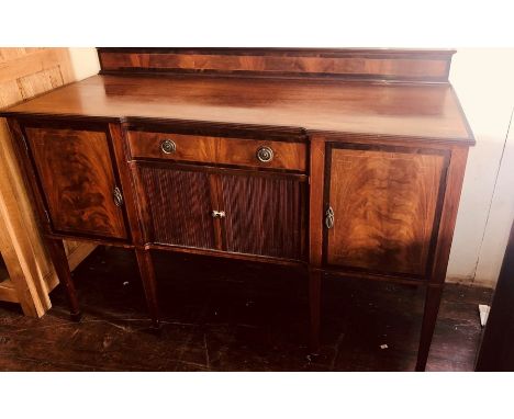 ****** ITEM LOCATION BISHTON HALL**********An Edwardian mahogany crossbanded inverted breakfront sideboard by James Shoolbred