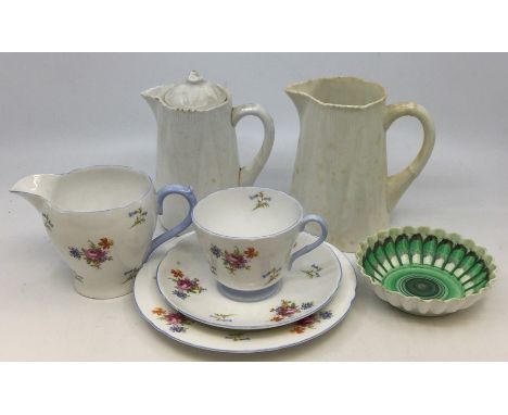 Shelley:&nbsp;A six piece tea service pattern no: 2036, white ground decorated with flowers and blue borders to include: cups