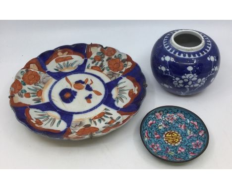 A group of Chinese Imari including charger and plates, painted with floral decoration in various styles together with a 20th 