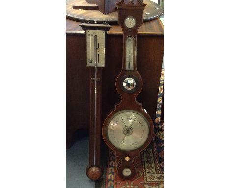 A George III mahogany stick barometer, broken arched pediment above the silvered dial, signed 'Bap. Roncheti & Co. Fecit', wi