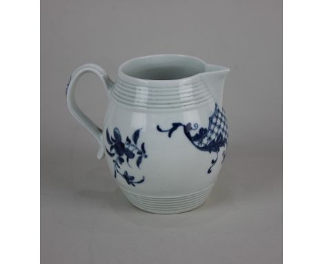 A Worcester porcelain barrel-shaped blue and white jug decorated with the Barrel Jug Scroll, 8cm high Provenance: From a loca