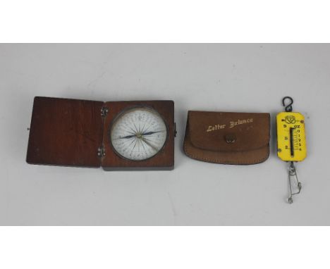 A 19th century pocket compass in square wooden box with hinged lid, 6.5cm and a set of Salter letter scales in leather pouch