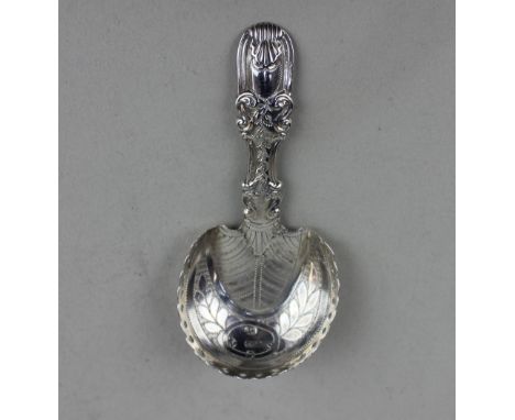 A George III silver caddy spoon by Cocks and Bettridge  with engraved hoof shaped galleried bowl, Birmingham 1816