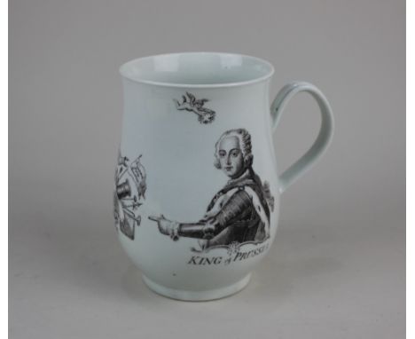 An 18th century Worcester porcelain bell shaped mug printed in black with a half-length portrait titled 'King of Prussia' poi