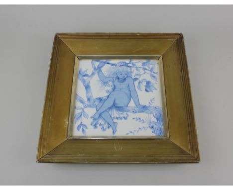 A large framed Minton's Art pottery blue and white tile probably designed by William Stephen Coleman decorated with a child s