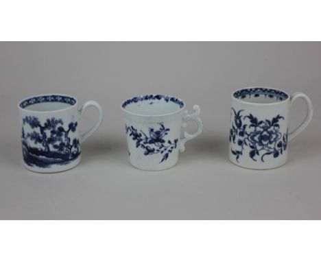 A Worcester blue and white porcelain coffee can with scroll handle and moulded exterior, together with two further Worcester 