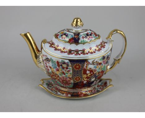 A Barr Flight &amp; Barr Worcester porcelain Japan pattern teapot and stand, with floral decoration and gilt embellishments, 