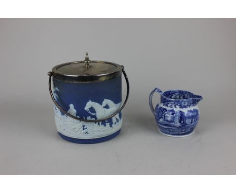 A Wedgwood blue jasperware biscuit barrel with silver plated lid and swing handle, 16cm high and a Spode Italian pattern blue