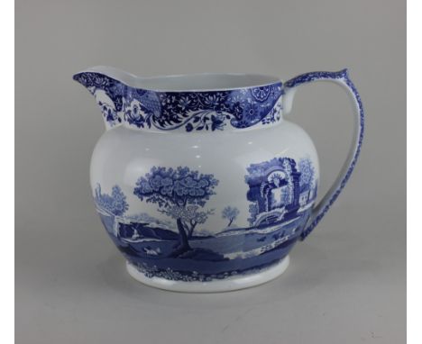 A large Spode blue and white jug decorated with the Italian pattern 23cm high