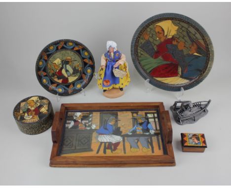 A collection of French Quimper carved wood polychrome decorated items, some indistinctly signed P Fouillen?, decorated with l
