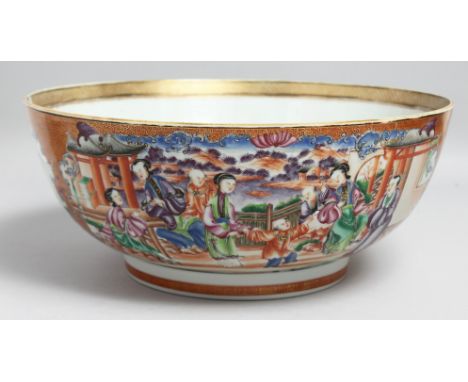 A LARGE CHINESE EXPORT HONEYCOMB GROUND PORCELAIN PUNCH BOWL, the exterior painted with two large panels of scenes with seate