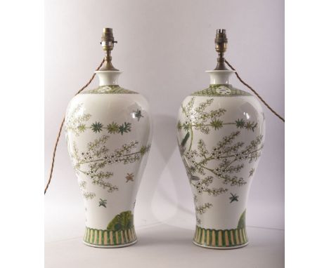 A GOOD PAIR OF CHINESE FAMILLE VERTE PORCELAIN VASE LAMPS, undrilled, painted with birds amongst blossom, mark to each base, 