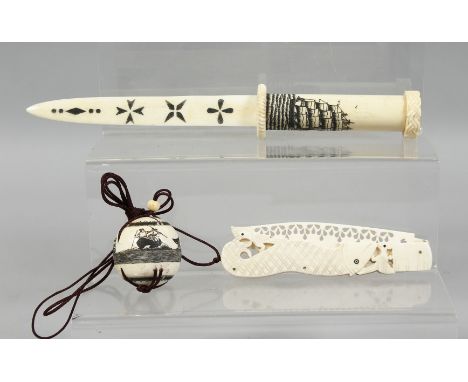 A COLLECTION OF THREE CARVED BONE PIECES, comprising two nautical items including a carved ball compass and a letter opener w