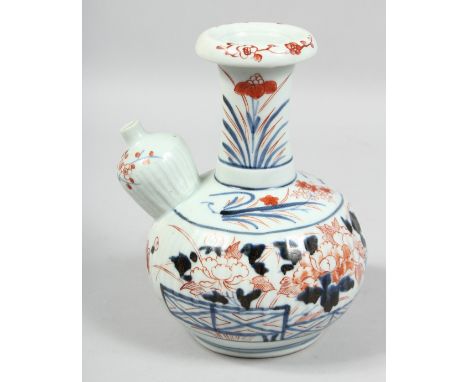 A JAPANESE IMARI PORCELAIN EWER, decorated with flowers, 21cm high.