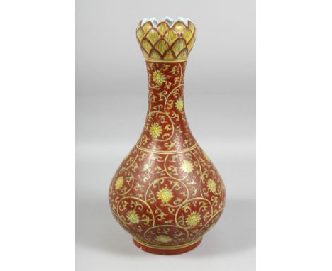 A GOOD LARGE CHINESE IRON-RED PORCELAIN GARLIC HEAD VASE, painted all over with flowerhead and scrolling vine motif in yellow