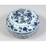 A CHINESE BLUE AND WHITE PORCELAIN CIRCULAR BOX AND COVER, decorated with phoenix and lotus, the rim