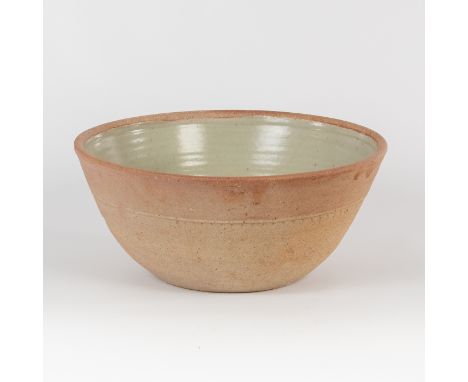 Richard Batterham (British, born 1936), a deep stoneware bowl, green ash glaze to interior, unglazed exterior, 37.5cm diamete