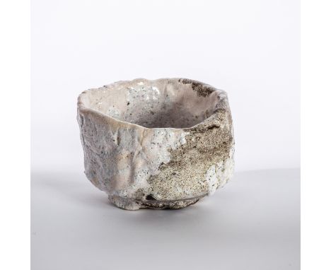 Ewen Henderson (British 1934-2000), a tea bowl of monochrome naturalistic form in mixed laminated clays, 10.5cm wide/Provenan