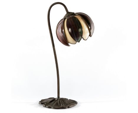 Loevsky &amp; Loevsky, an American Art Nouveau table lamp, the metal base formed as a lily pad, the stem extending into a flo