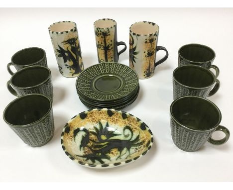 Celtic Pottery, Newlyn Cornwall, a small group of Phoenix pattern pottery comprising a pair of tall coffee mugs, a smaller mu