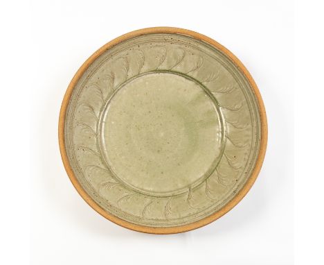 Richard Batterham (British, born 1936), a monumental stoneware bowl, green ash glaze to the interior with incised foliate fro
