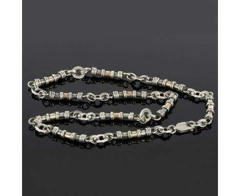 Georg Jensen, a Danish silver chain with ring and T-bar clasp, 80cm long and two other silver chains, gross weight approximat