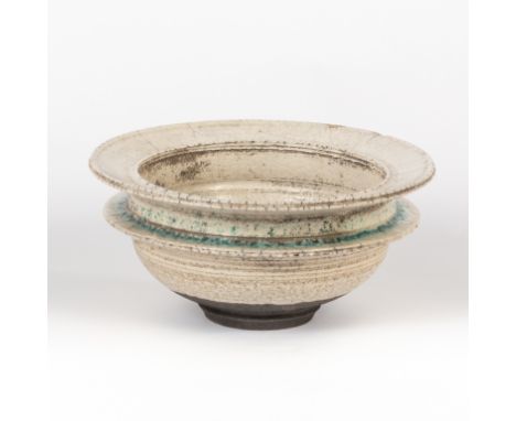 Robin Welch (British, born 1936), a double-rim earthenware bowl, white crackle glaze with deep blue well and banding around t