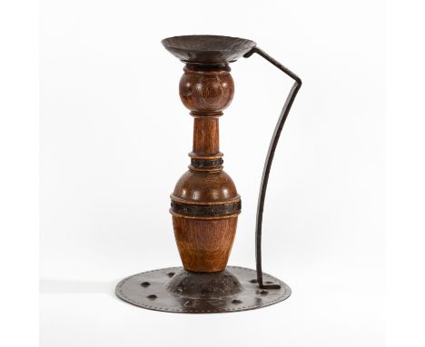 A Jugendstil copper and wood candlestick by Goberg, 23cm high