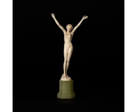 Ferdinand Preiss (1882-1943), Youth, a carved ivory nude, her arms raised, on an octagonal onyx plinth, 22cm high (damages) C