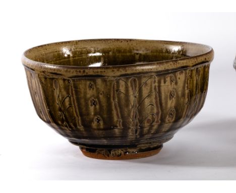 Mike Dodd, a celadon glaze bowl with incised decoration of grasses, 25cm diameter CONDITION REPORT: ARR Artist's Resale Right