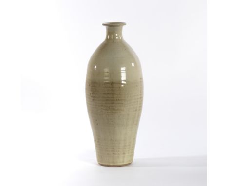 Paul Barron (British 1917-1983), a tall bottle vase of ribbed design with cream glaze, seal mark, 34cm high CONDITION REPORT: