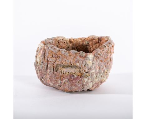 Ewen Henderson (British 1934-2000), a tea bowl of pink and white naturalistic form in mixed laminated clays, 10.5cm wide/Prov