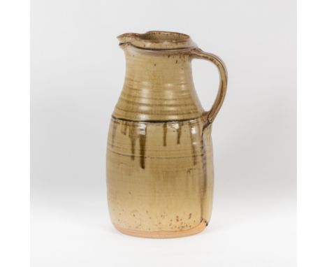 Richard Batterham (British, born 1936), a large stoneware jug, green ash running glaze with horizontal rib to centre, 39.5cm 