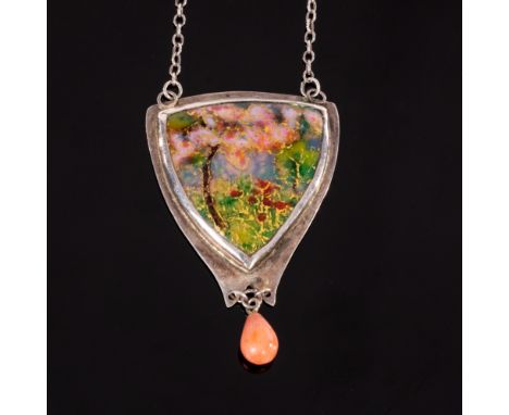 An Art Nouveau enamel pendant, the triangular plaque set with an enamel panel of an apple tree in blossom, a coral drop below