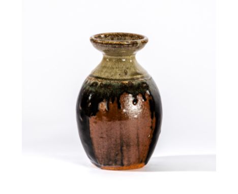 Richard Batterham (British, born 1936), a square form earthenware bottle vase with flared neck and dripped tenmoku glaze, pai