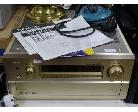 A Denon amplifier AVC-A1SE.