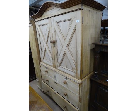 A continental pine 2-section linen press, width 3'10", height 6'6".