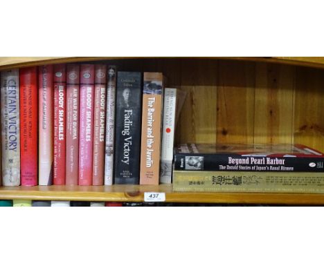 A shelf of books about war including "Bloody Shambles."