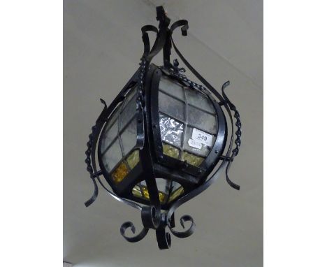 A Moroccan design wrought-iron hanging lantern.