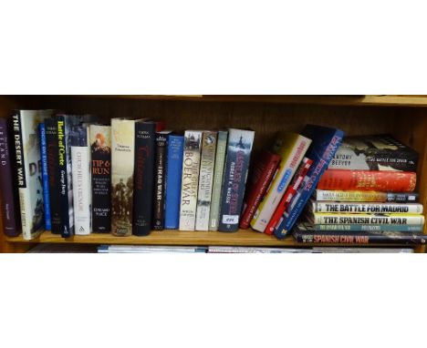 Shelf of books on Boer War, Spanish Civil War, etc.