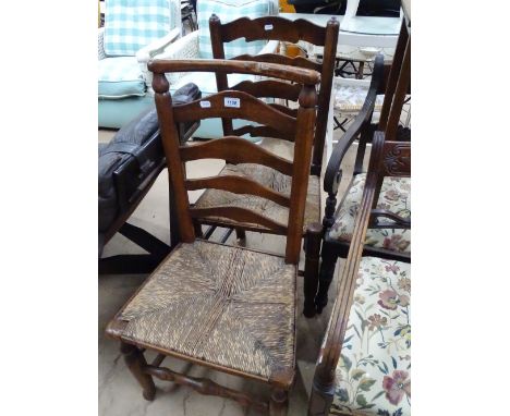 2 19th century rush seated ladder back side chairs.