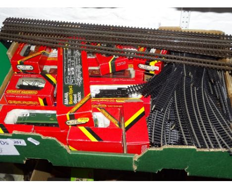 Hornby 00 gauge boxed railway carriages, wagons, engine and track.