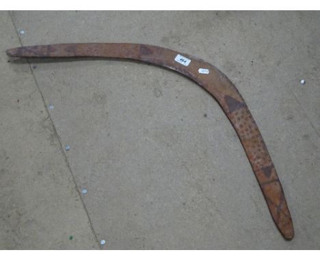 A painted Aboriginal boomarang.