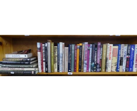 A shelf of books including World War I, Hitler, Royal Airforce, etc.