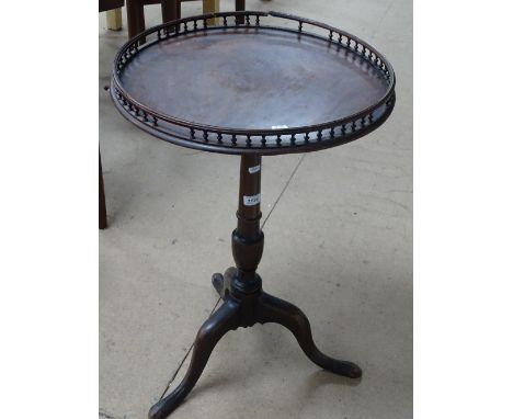 George III mahogany silver table, with spindle gallery on tripod legs, width 1'8", height 2'5".